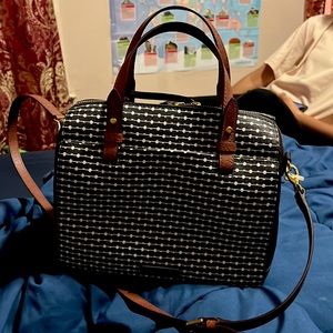 Fossil bag, used about 3 times, very new. Come from a no pet no smoking home.